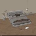 Modern Double Bed With Upholstered Headboard Plush Pillows And Beige Rug On Wooden Floor