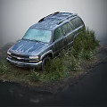 Old Dirty SUV Parked On Wet Ground With Weeds And Ferns Around
