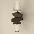 Modern Geometric Wall Lamp Featuring White Lampshade and Dark Frame on Beige Wall