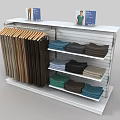 Organized Colored Pants and Folded Clothes on White Retail Display Rack