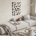 Modern Three Seater Sofa With Checkered Pillow Brown Round Cushion Abstract Art And Floor Lamp