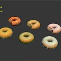 Six Fresh Bitten Donuts With Orange Glaze And Sugar Coated On Black Background
