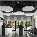 Modern Retail Store Interior With Product Shelves And Circular Ceiling Lights