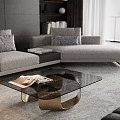 Elegant Modern Coffee Table With Glass Top Bronze Frame And Open Magazines In Living Room
