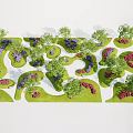 Landscape Design Model with Green Grass Irregular Shapes Trees and Purple Pink Flower Clusters