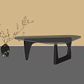 Modern Glass Top Coffee Table with Black Metal Legs and Decorative Vase with Twigs