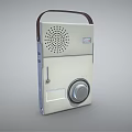 Vintage Portable Audio Speaker With Handle Speaker Grille Control Knob And Metallic Finish