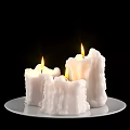 Decorative Candle Ornament Set With Three Burning White Candles On White Plate
