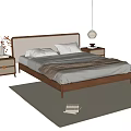 Modern Double Bed with Gray White Pillows Brown Blanket Nightstands Vase on Light Colored Rug