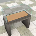 Display Cabinet Shelf With Glass Cover Brown Surface And Wooden Base On Checkerboard Tile Floor