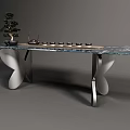Modern Tea Table With Marble Top Butterfly Shaped Steel Legs And Teapot Cups Bonsai Plant
