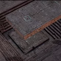 Ancient Stone Structure With Layered Slabs And Arranged Patterns In Archaeological Site