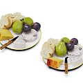 Fresh Pears And Figs With Cheese Bread Slices On Two Plates And Knives