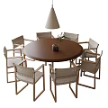 Wooden Round Dining Table and Rattan Chairs Set with Pendant Light and Small Plant Centerpiece