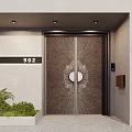 Modern Entrance Door With Engraved Metal Patterns And Green Plants Near House Number