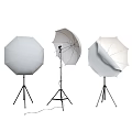 Professional Photography Lighting Equipment With Softbox Studio Light And Reflector On Tripod Stands