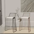 Modern Bar Stools With Metal Frame And White Cushioned Seat In Minimalist Interior
