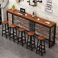 Wooden Bar Counter Featuring Black Metal Frame Stools Laptop Coffee Cups and Green Plant