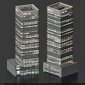 Twin Modern High Rise Office Buildings With Glass Curtain Walls And Illuminated Exteriors