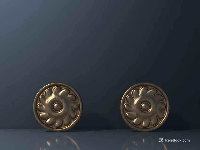 Two Golden Circular Decorative Hardware Tools With Floral Pattern Design 3d model