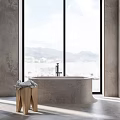 Concrete Bathtub in Modern Bathroom with Large Window and Mountain View Wooden Stool Holding Towel