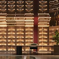 Hotel Lobby Interior With Red Walls Bar Counter Wine Shelves Bar Stools And Decorative Plants