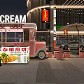 Vibrant Commercial Street At Night With Shops Pedestrians And Outdoor Seating