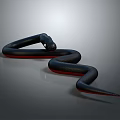 Black Snake With Red Accents Coiled On Smooth Gray Surface