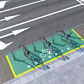 Bicycle Parking Facilities On Road With Green Area Cycle Stands And Directional Arrows
