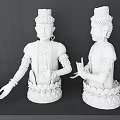 Two white decorative sculptures with headdress earrings and lotus base
