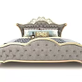 Elegant Gray Upholstered Double Bed With Gold Accents And Carved Headboard