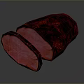 Close Up View of Sliced Roast Meat with Charred Surface and Pink Interior