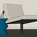 Modern Minimalist Leisure Chair With White Cushion Black Metal Frame And Blue Side Table