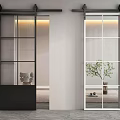 Modern Black And White Barn Doors With Grid Glass Panels In Interior Space