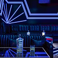 Modern KTV Interior Design With Colorful Neon Lighting Multiple Screens And Stage