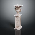 White Classical Carved Pedestal Column With Intricate Details And Decorative Vase Top