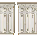 Classical White Wardrobe With Ornate Gold Carvings And Decorative Cabinet Doors