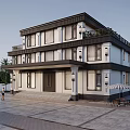 Two Story Detached Villa With Black Roof White Walls Balcony Front Steps And Outdoor Seating