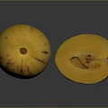 Fresh Yellow Fruit with Red Stripes Halved Showing Juicy Yellow Flesh and Small Seeds