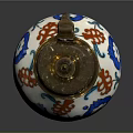 Ornate Ceramic Vase With Blue Red Floral Patterns And Gold Accents