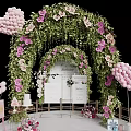 Floral Display With Flower Arch Green Leaves Pink Blooms And Heart Balloons For Wedding Backdrop