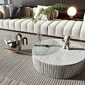 Stylish Coffee Table With Glass Top And Textured Base Near Beige Sofa Green Plant And Lamp