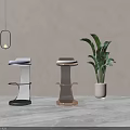 Modern Bar Stools With Black And Gold Metal Frames Upholstered Seats Gray Floor And Plant