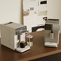 Modern Coffee Makers On Wooden Table With Coffee Cup And Milk Jug