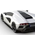 White Sports Car With Sleek Aerodynamic Design And Large Alloy Wheels