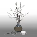 Blue and White Ceramic Vase With White Blossom Branches And Teacup Saucer