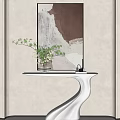 Modern White Console Table With Green Plant And Abstract Painting On Light Wall