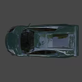 Dark Green Sports Car With Sleek Design And Black Wheels Rear Spoiler