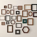 Wall Display of Various Shaped Picture Frames in Heart Arrangement with Different Colors