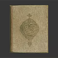 Intricate Carved Design on Vintage Leather Book Cover with Ornate Emblem